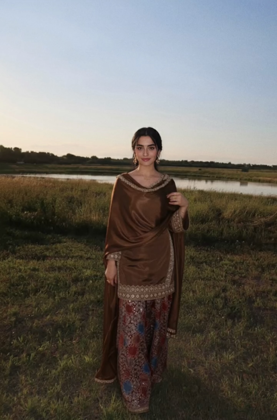 This ensemble evokes a timeless, classic charm .